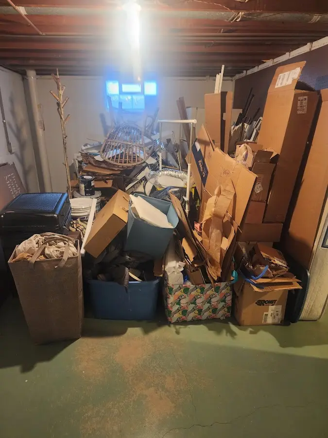 Roll-off dumpster container at job site for 2 Yard Dumpster Rental in Tuba City